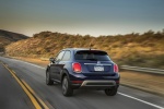 Picture of a driving 2016 Fiat 500X in Blu Venezia from a rear left perspective