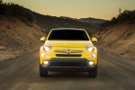 Picture of a driving 2016 Fiat 500X in Giallo Tristrato from a frontal perspective