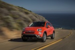 Picture of a driving 2016 Fiat 500X AWD in Arancio from a front left perspective