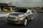 Picture of a driving 2016 Fiat 500X in Bronzo Magnetico Opaco from a front left perspective