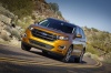 Picture of a driving 2017 Ford Edge Sport from a front left perspective