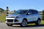 Picture of a 2014 Ford Escape Titanium 4WD in Ingot Silver Metallic from a front left three-quarter perspective