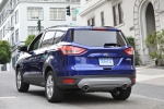 Picture of a 2014 Ford Escape SE in Deep Impact Blue from a rear left perspective