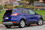 Picture of a 2015 Ford Escape SE in Deep Impact Blue from a rear right three-quarter perspective