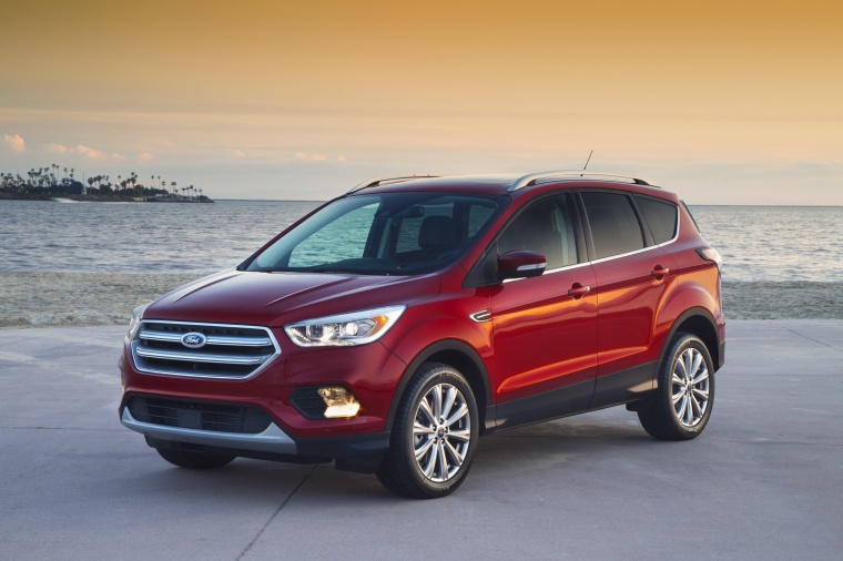 Picture of a 2017 Ford Escape Titanium in Ruby Red Metallic Tinted Clearcoat from a front left three-quarter perspective