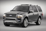 Picture of a 2015 Ford Expedition Platinum in Magnetic Metallic from a front left three-quarter perspective