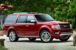 Picture of a 2015 Ford Expedition Platinum in Ruby Red Metallic Tinted Clearcoat from a front right three-quarter perspective