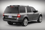 Picture of a 2015 Ford Expedition Platinum in Magnetic Metallic from a rear right three-quarter perspective