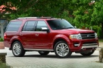 Picture of a 2016 Ford Expedition Platinum in Ruby Red Metallic Tinted Clearcoat from a front right three-quarter perspective