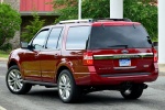 Picture of a 2016 Ford Expedition Platinum in Ruby Red Metallic Tinted Clearcoat from a rear left three-quarter perspective