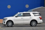 Picture of a 2019 Ford Expedition Platinum in Oxford White from a left side perspective