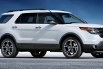 Picture of a 2014 Ford Explorer Sport 4WD in White Platinum Metallic Tri-Coat from a front right three-quarter perspective