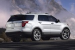 Picture of a 2014 Ford Explorer Limited 4WD in White from a rear right three-quarter perspective
