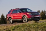 Picture of a 2014 Ford Explorer Sport 4WD in Ruby Red Metallic Tinted Clearcoat from a front right three-quarter perspective