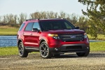 Picture of a 2014 Ford Explorer Sport 4WD in Ruby Red Metallic Tinted Clearcoat from a front right perspective