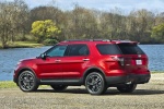 Picture of a 2014 Ford Explorer Sport 4WD in Ruby Red Metallic Tinted Clearcoat from a rear left three-quarter perspective