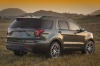 Picture of a 2016 Ford Explorer Sport 4WD in Magnetic Metallic from a rear right three-quarter perspective