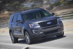 Picture of a driving 2016 Ford Explorer Sport 4WD in Magnetic Metallic from a front right perspective