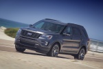 Picture of a driving 2016 Ford Explorer Sport 4WD in Magnetic Metallic from a front left three-quarter perspective