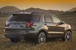 Picture of a 2018 Ford Explorer Sport 4WD in Magnetic Metallic from a rear right three-quarter perspective