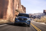 Picture of a driving 2020 Ford Explorer ST EcoBoost 4WD in Atlas Blue Metallic from a frontal perspective