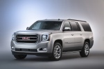Picture of a 2018 GMC Yukon XL in Quicksilver Metallic from a front left three-quarter perspective