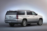 Picture of a 2018 GMC Yukon XL in Quicksilver Metallic from a rear right three-quarter perspective