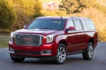 Picture of a 2018 GMC Yukon XL Denali in Red from a front left perspective