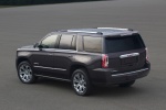 Picture of a 2018 GMC Yukon Denali from a rear left three-quarter perspective
