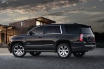 Picture of a 2018 GMC Yukon Denali in Onyx Black from a rear left three-quarter perspective