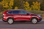 Picture of a 2014 Honda CR-V EX-L AWD in Basque Red Pearl II from a side perspective