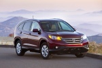 Picture of a 2014 Honda CR-V EX-L AWD in Basque Red Pearl II from a front right perspective