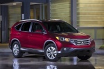 Picture of a 2014 Honda CR-V EX-L AWD in Basque Red Pearl II from a front right three-quarter perspective