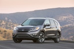Picture of a 2015 Honda CR-V Touring in Modern Steel Metallic from a front left three-quarter perspective