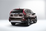Picture of a 2015 Honda CR-V Touring in Modern Steel Metallic from a rear right three-quarter perspective