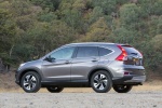 Picture of a 2015 Honda CR-V Touring in Modern Steel Metallic from a rear left three-quarter perspective