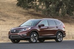 Picture of a 2015 Honda CR-V Touring AWD in Basque Red Pearl II from a front left three-quarter perspective