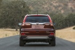 Picture of a 2015 Honda CR-V Touring AWD in Basque Red Pearl II from a rear perspective