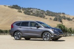 Picture of a 2016 Honda CR-V Touring in Modern Steel Metallic from a side perspective