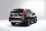 Picture of a 2016 Honda CR-V Touring in Modern Steel Metallic from a rear right three-quarter perspective