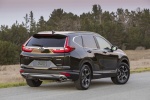 Picture of a 2017 Honda CR-V Touring AWD in Crystal Black Pearl from a rear right perspective