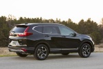 Picture of a 2017 Honda CR-V Touring AWD in Crystal Black Pearl from a rear right three-quarter perspective