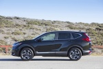 Picture of a 2017 Honda CR-V Touring AWD in Crystal Black Pearl from a side perspective
