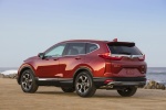 Picture of a 2017 Honda CR-V Touring AWD in Molten Lava Pearl from a rear left perspective