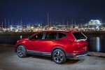 Picture of a 2017 Honda CR-V Touring AWD in Molten Lava Pearl from a rear left three-quarter perspective