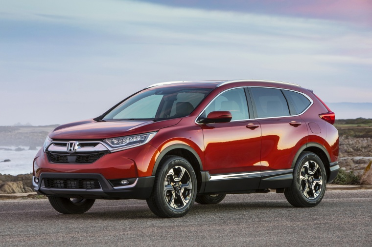 Picture of a 2018 Honda CR-V Touring AWD in Molten Lava Pearl from a front left three-quarter perspective