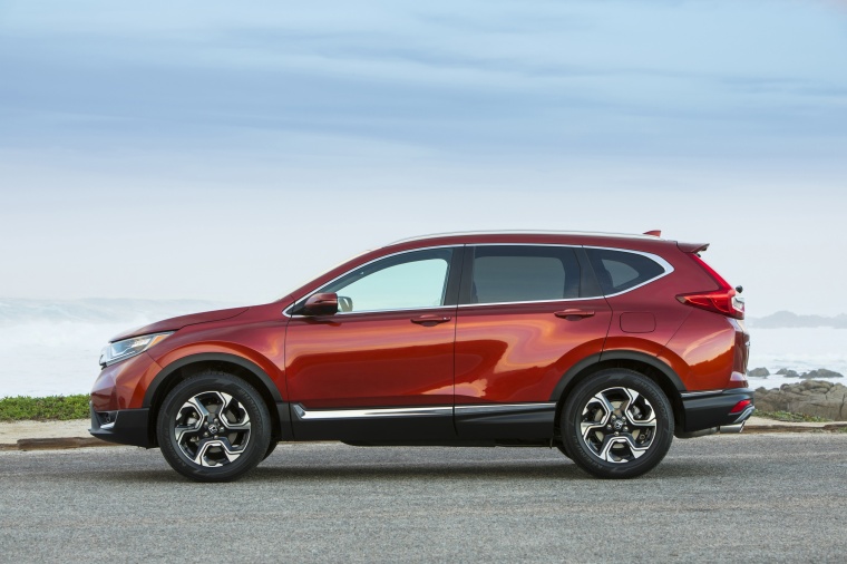 Picture of a 2018 Honda CR-V Touring AWD in Molten Lava Pearl from a side perspective