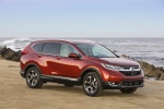 Picture of a 2018 Honda CR-V Touring AWD in Molten Lava Pearl from a front right perspective