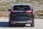 Picture of a 2018 Honda CR-V Touring AWD in Crystal Black Pearl from a rear perspective