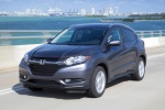 Picture of a driving 2016 Honda HR-V AWD in Modern Steel Metallic from a front left perspective
